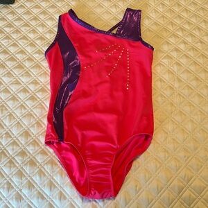 Danskin now leotard size medium 7 to 8. pink and purple
